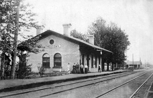 black and white image of old rural railway station