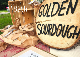 golden sourdough sign in Bath market