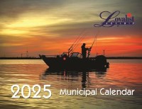 2025 calendar front page showing a fishing boat at sunset