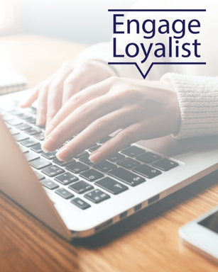 Person typing on a laptop with wordmark overlay reading Engage Loyalist