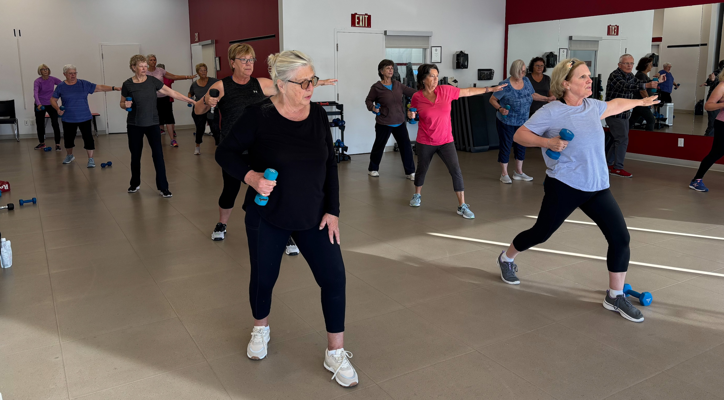 Senior taking part in fitness class